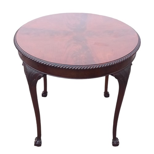 322 - A FLAME MAHOGANY LAMP TABLE