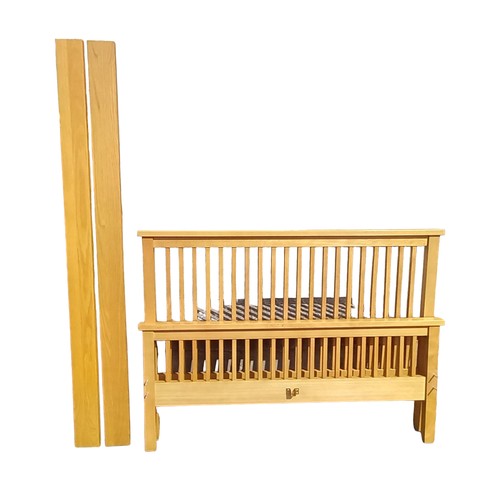 333 - AN OAK 5FT BED FRAME