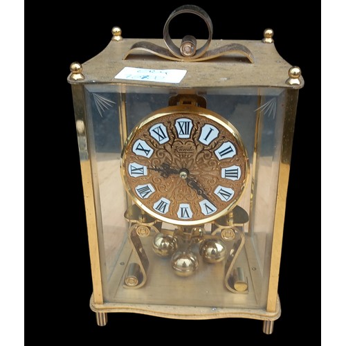 340 - A BRASS ANNIVERSARY CLOCK