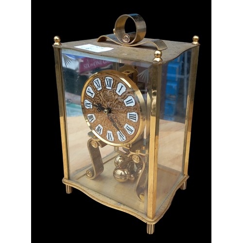 340 - A BRASS ANNIVERSARY CLOCK