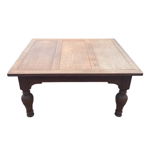 347 - A RUSTIC OAK COFFEE TABLE