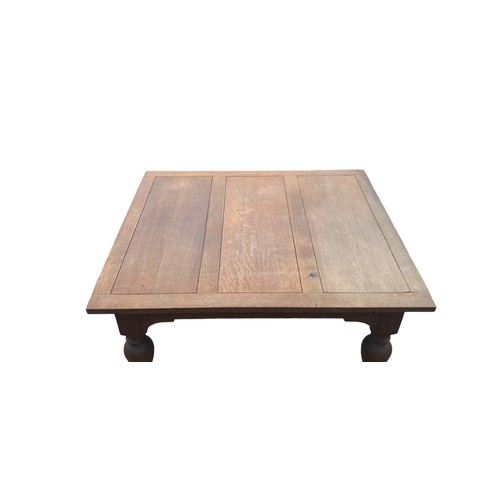 347 - A RUSTIC OAK COFFEE TABLE