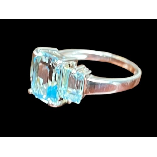 449 - A SILVER BLUE TOPAZ SET RING