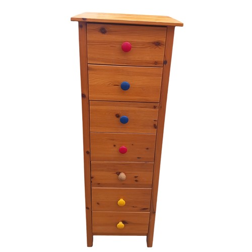 364 - A NARROW 7  DRAWER PINE CHEST OF DRAWERS