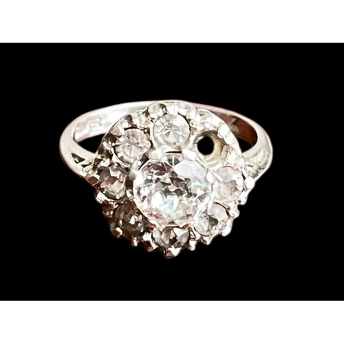 510 - A SILVER GEMSET CLUSTER RING (1 STONE MISSING)