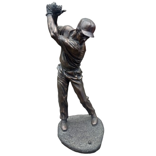 390 - A LARGE  GOLFING FIGURE IN A BRONZE FINISH