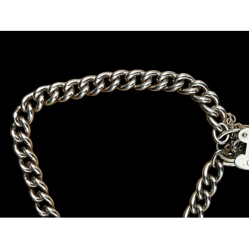 542 - A HEAVY SILVER WRIST ALBERT LINK CHAIN WITH SILVER HEART LOCK 18.8g