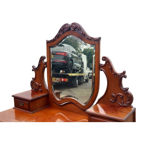 393 - A VICTORIAN WALNUT DRESSING CHEST WITH ORNATE MIRROR