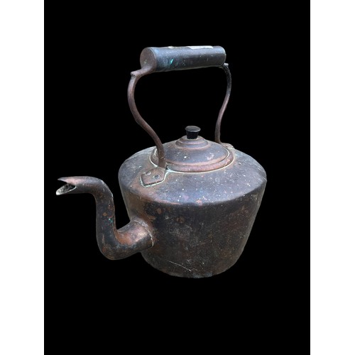 404 - AN ANTIQUE COPPER KETTLE