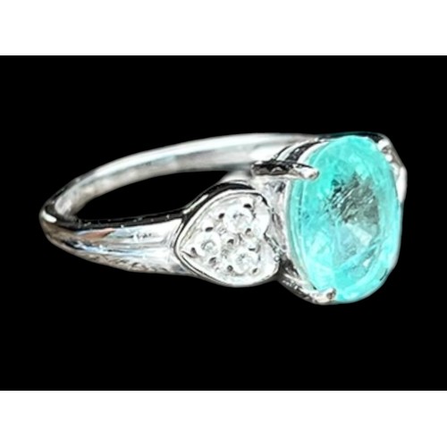 558 - AN 18ct BLUE TORMALINE RING SET WITH MOUNT IN DIAMONDS 3.4grm