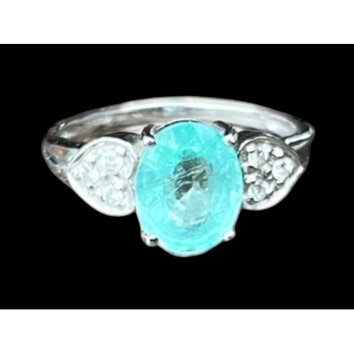 558 - AN 18ct BLUE TORMALINE RING SET WITH MOUNT IN DIAMONDS 3.4grm