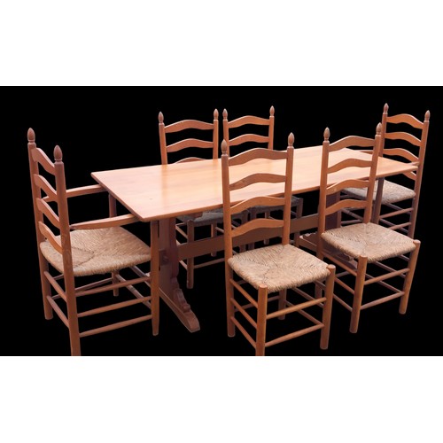 425 - A PINE ERCOL STYLE TRESEL TABLE WITH 6 CHAIRS TO MATCH