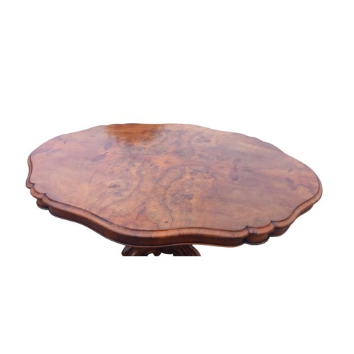 433 - A STUNNING VICTORIAN BURR WALNUT PEDESTAL TABLE ON A VERY ORNATE HEAVILY CARVED QUAD BASE