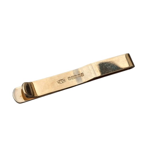 583 - A 9ct GOLD TIE CLIIP