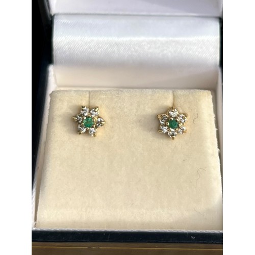 590 - A PAIR OF 9ct GOLD EMEARLD AND DIAMOND EARRINGS