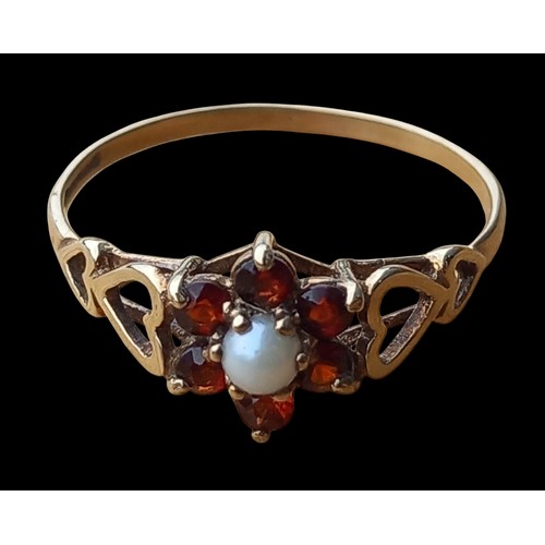 594 - A 9ct GOLD GARNET AND PEARL SET RING SIZE T 1.45grm