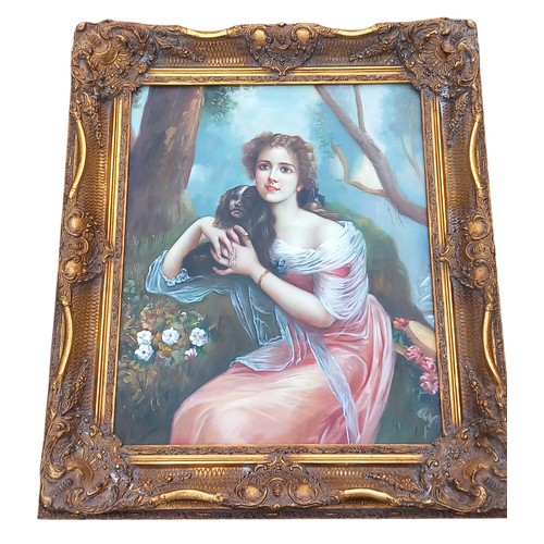 650 - AN UNSIGNEDPORTRAIT IN OILS  OIL ON CANVAS OF A LADY WITH  DOG IN HEAVY ORNATE GILT FRAME 28X31