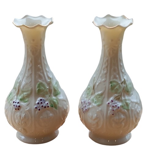 675 - A PAIR OF BROWN STAMPED BELLEEK VASE WITH BERRY PATTERN