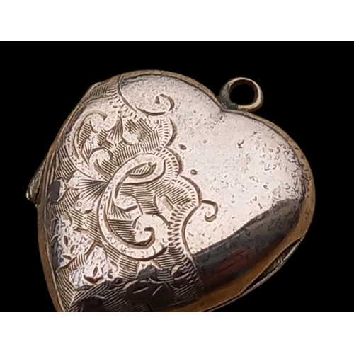 623 - A 9ct GOLD HEART LOCKET 2.8grm