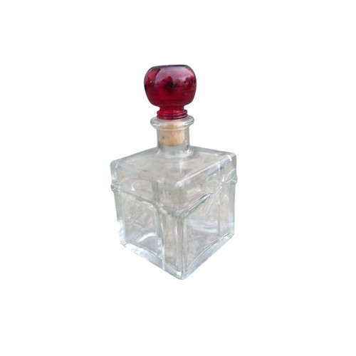 694 - 2 PERFUME BOTTLES WITH CRANBERRY GLASS TOPS