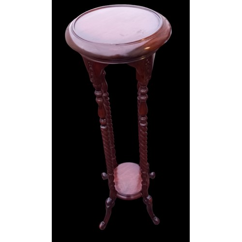 690 - A GOOD QUALITY BARLEY TWIST MAHOGANY PLANTSTAND