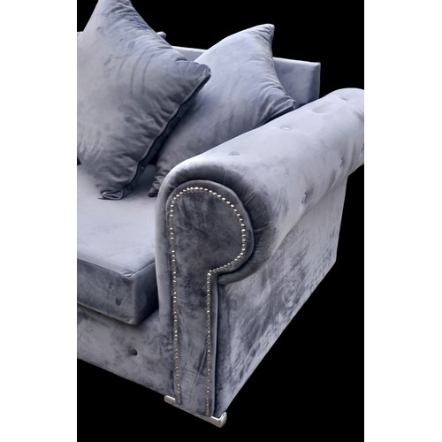 500A - A 3 AND 2 GREY VELVET SCROLL ARM WITH DEEP BUTTON HAS CHROME STUDS AND FEET