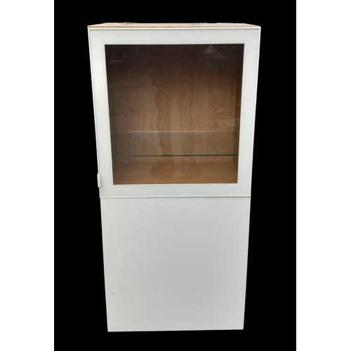 125A - A BEECH AND GLASS DISPLAY CABINET