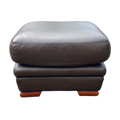 680B - A BROWN LEATHER FOOTSTOOL