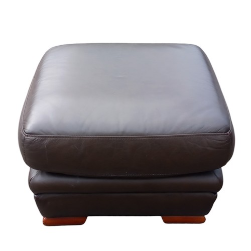 680B - A BROWN LEATHER FOOTSTOOL