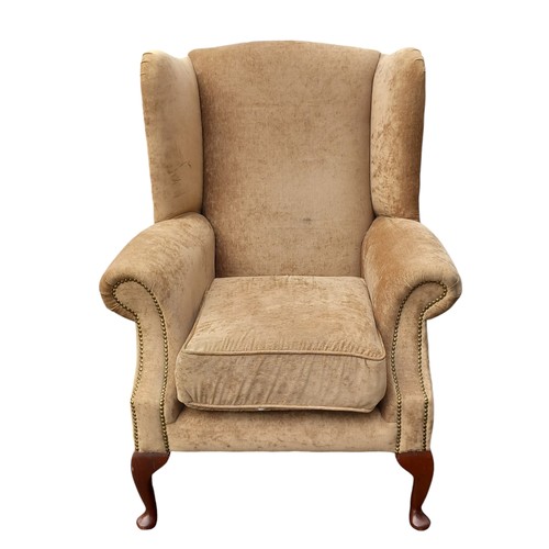 684B - AN OATMEAL COLOUR WINGBACK ARMCHAIR