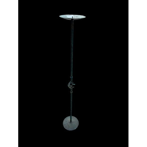 84 - A 3ft TALL METAL CANDLESTAND IN AN ANTIQUE FINISH