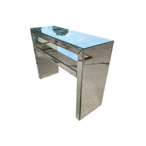 105 - A MIRRORED CONSOL TABLE (slight cracks in mirror)