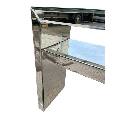 105 - A MIRRORED CONSOL TABLE (slight cracks in mirror)