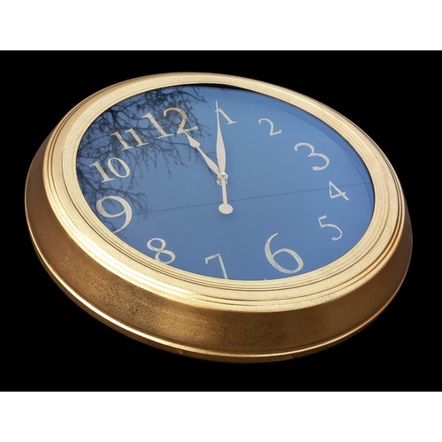 118 - A NEW GILT FRAMED WALL CLOCK 18