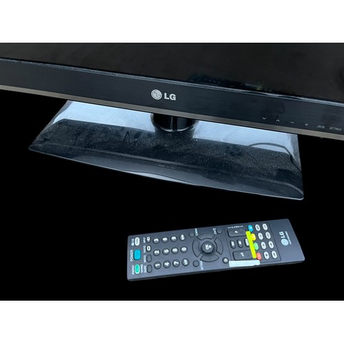 154 - AN LG TV WITH REMOTE 26