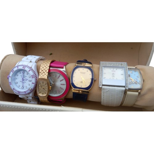 40 - A QUANTITY OF WATCHES IN WATCH CARRIER CASE