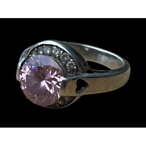 251 - A SILVER RING SET WITH PINK STONE