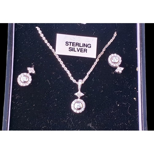 256 - SILVER AND GEMSET NECKLACE AND MATCHING EARRINGS