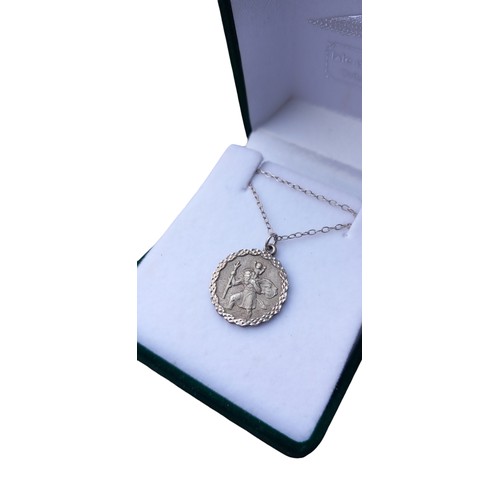 262 - A SILVER CHAIN AND SILVER ST CHRISTOPHER PENDANT