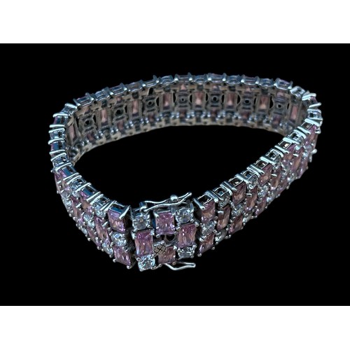 277 - A DESIGNER HIGH QUALITY SILVER BRACELET WITH PUSH CLASP SET WITH PINK AND WHITE STONES 50.5g