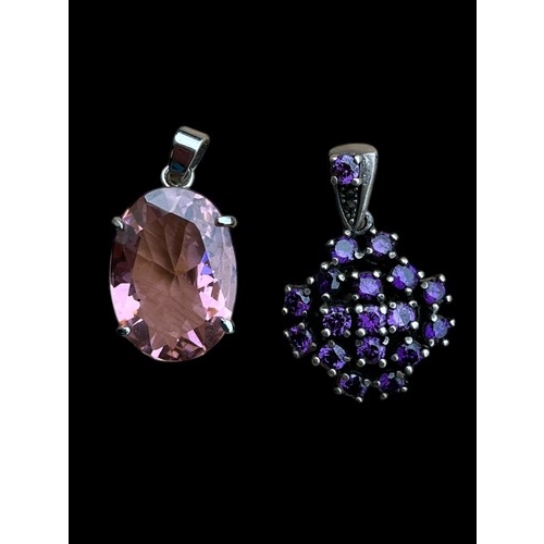 285 - AN 18ct WHITE GOLD PLATED PENDANT SET WITH PINK STONE AND 1 OTHER