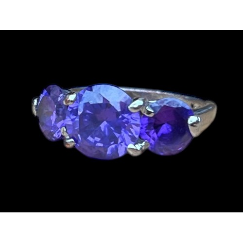 298 - A SILVER 3 STONE AMETHYST STYLE RING  SIZE O