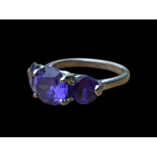 298 - A SILVER 3 STONE AMETHYST STYLE RING  SIZE O