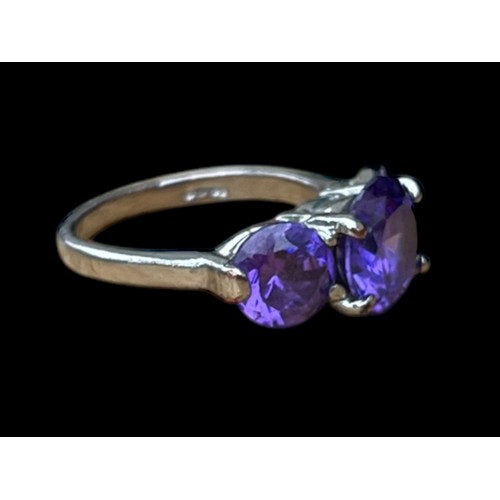 298 - A SILVER 3 STONE AMETHYST STYLE RING  SIZE O