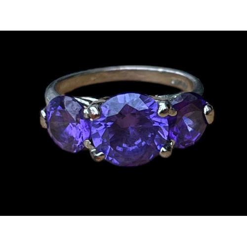 298 - A SILVER 3 STONE AMETHYST STYLE RING  SIZE O