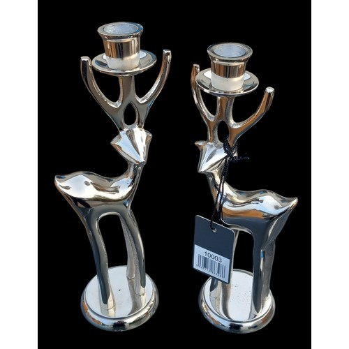 313 - A NEW PAIR OF CHROME RHEINDEER CANDLE HOLDERS 11