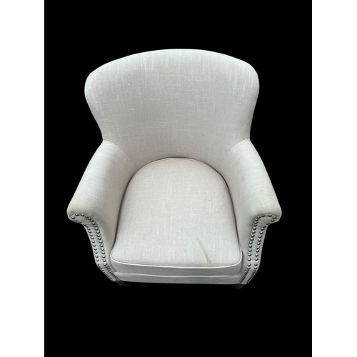 318 - A NICELY SHAPED ARMCHAIR WITH STUDDED FRONT