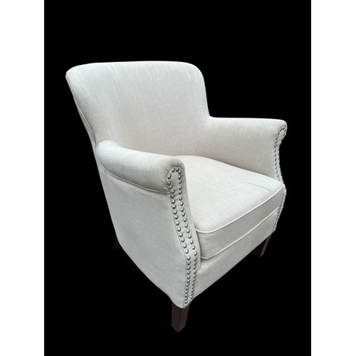 318 - A NICELY SHAPED ARMCHAIR WITH STUDDED FRONT