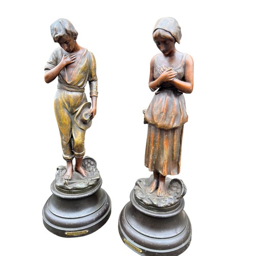 324 - A PAIR OF SPELTER HARVEST FIGURINES 18