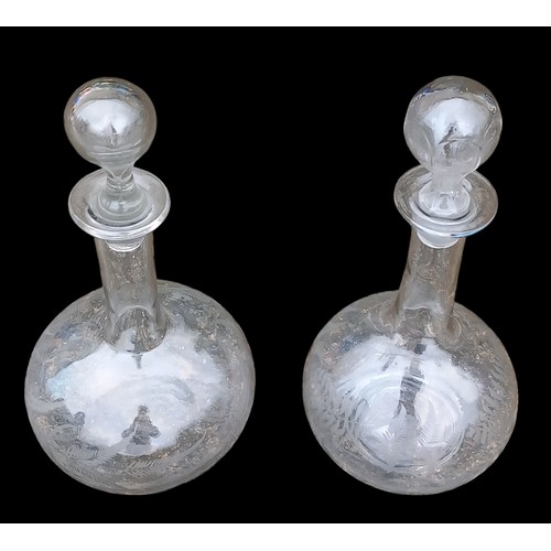 390 - A PAIR OF ANTIQUE FERN PATTERNED DECANTERS WITH MATCHING STOPPERS